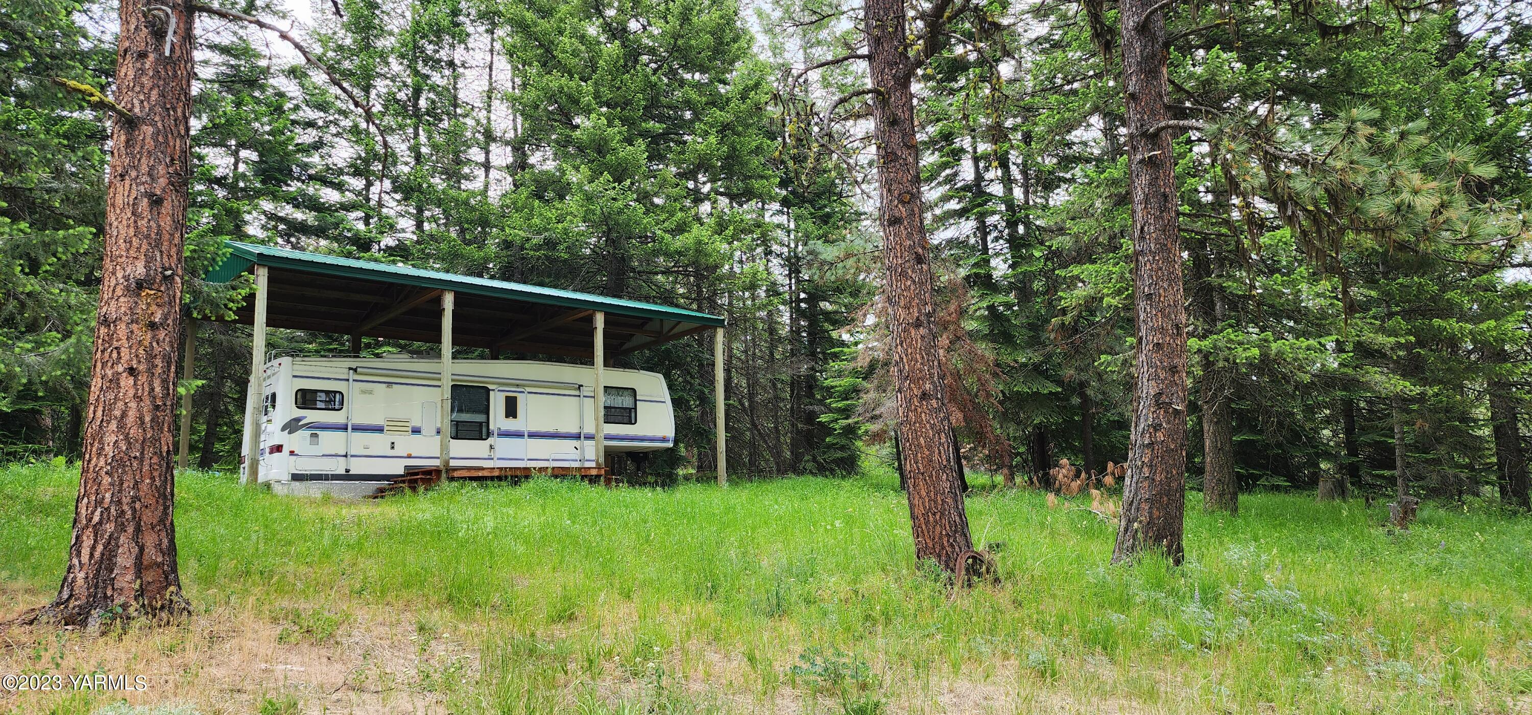 384 Cody Road Anatone, WA 99401 - Photo 4 of 33 a view of a house with backyard