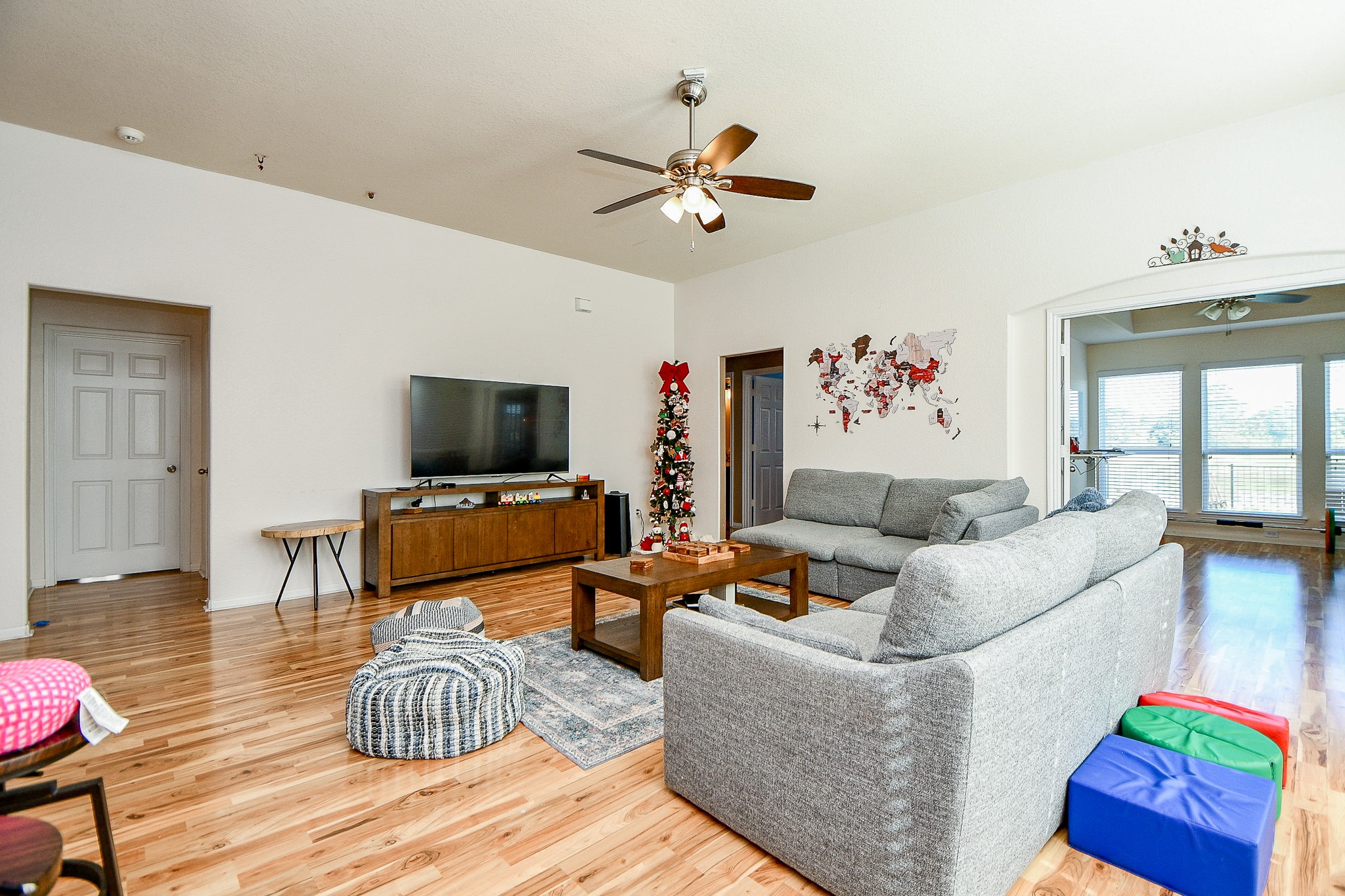 15462 Signal Ridge Way Cypress, TX 77429 - Photo 11 of 37 a living room with furniture and a flat screen tv
