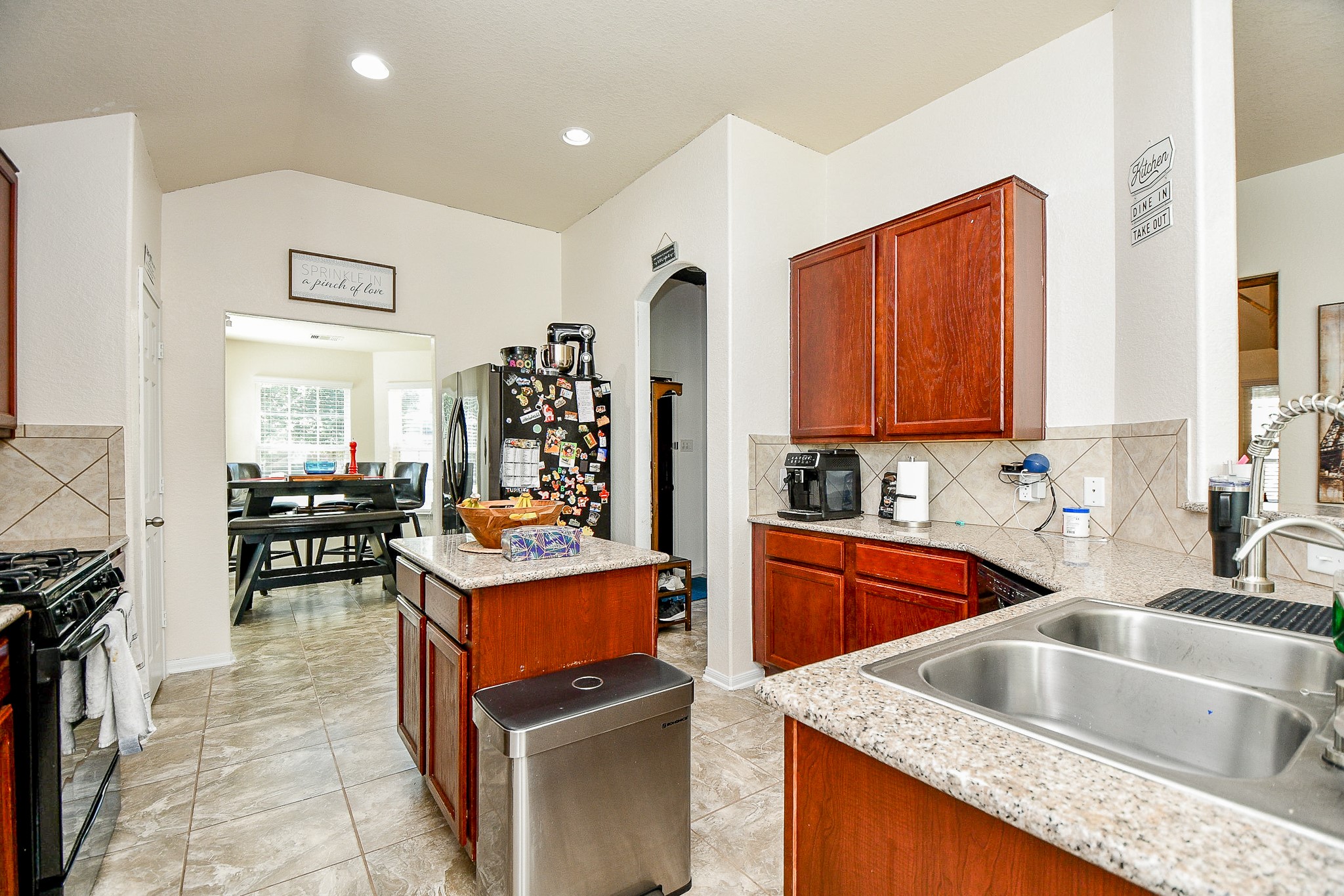 15462 Signal Ridge Way Cypress, TX 77429 - Photo 12 of 37 a kitchen that has a sink and a stove in it