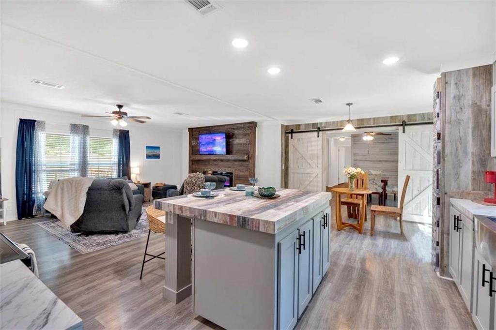 196 Whitestone Drive Talking Rock, GA 30175 - Photo 15 of 62 a kitchen that has a lot of cabinets a sink and a stove in it