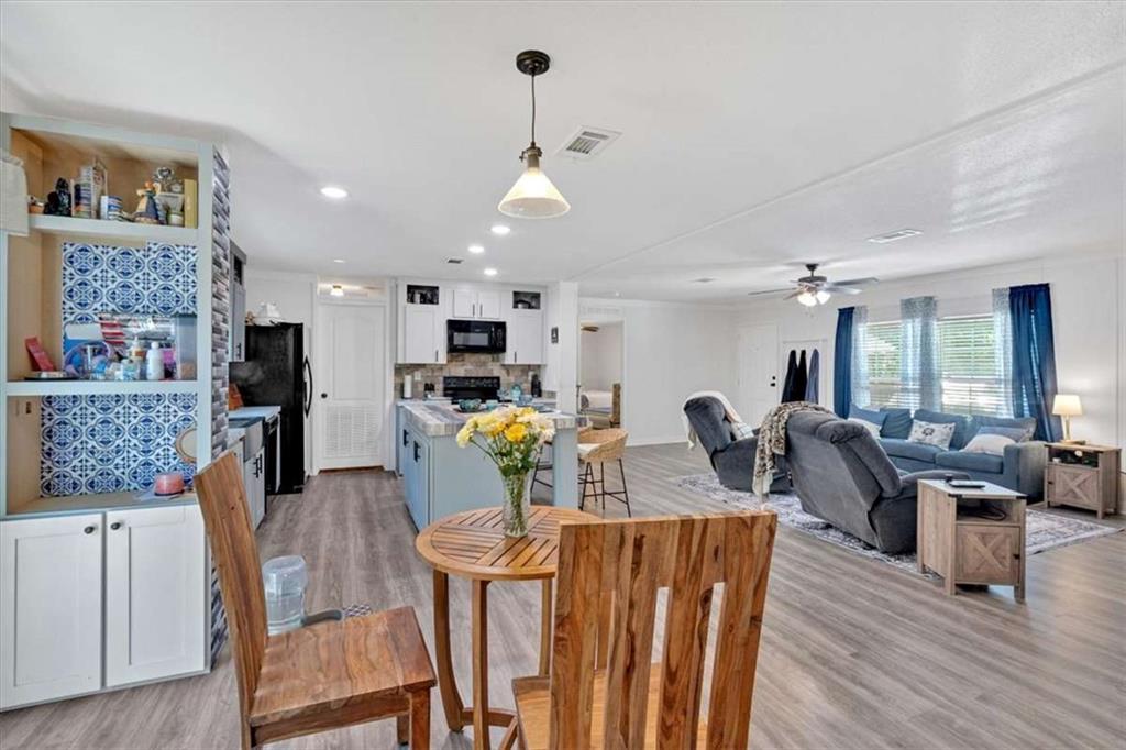 196 Whitestone Drive Talking Rock, GA 30175 - Photo 17 of 62 a living room with furniture and kitchen view