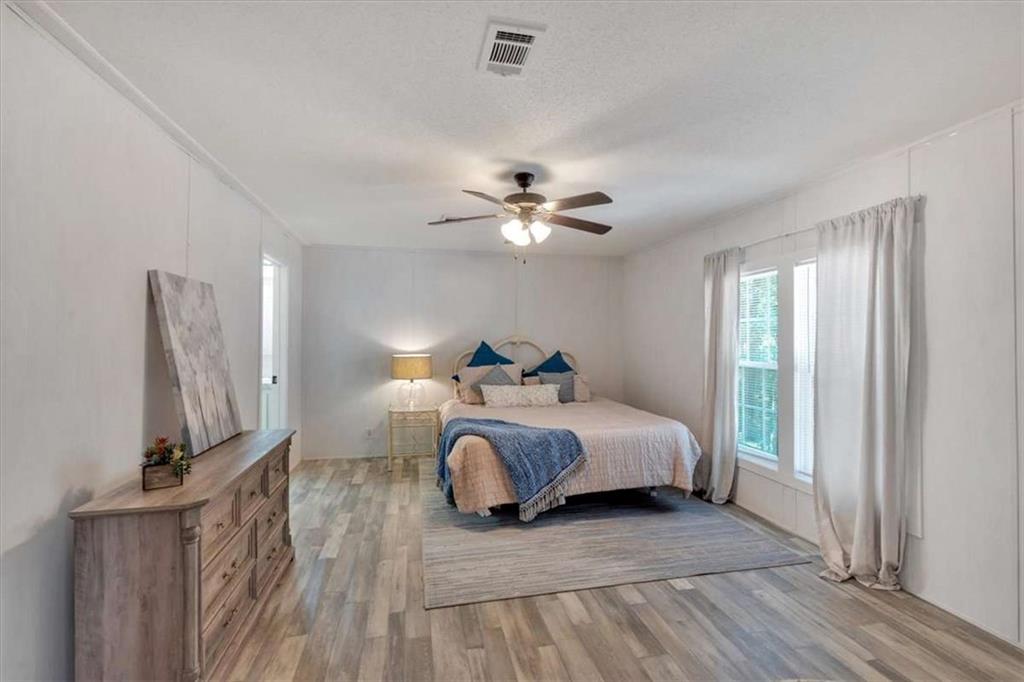 196 Whitestone Drive Talking Rock, GA 30175 - Photo 28 of 62 a bed room with bed and window