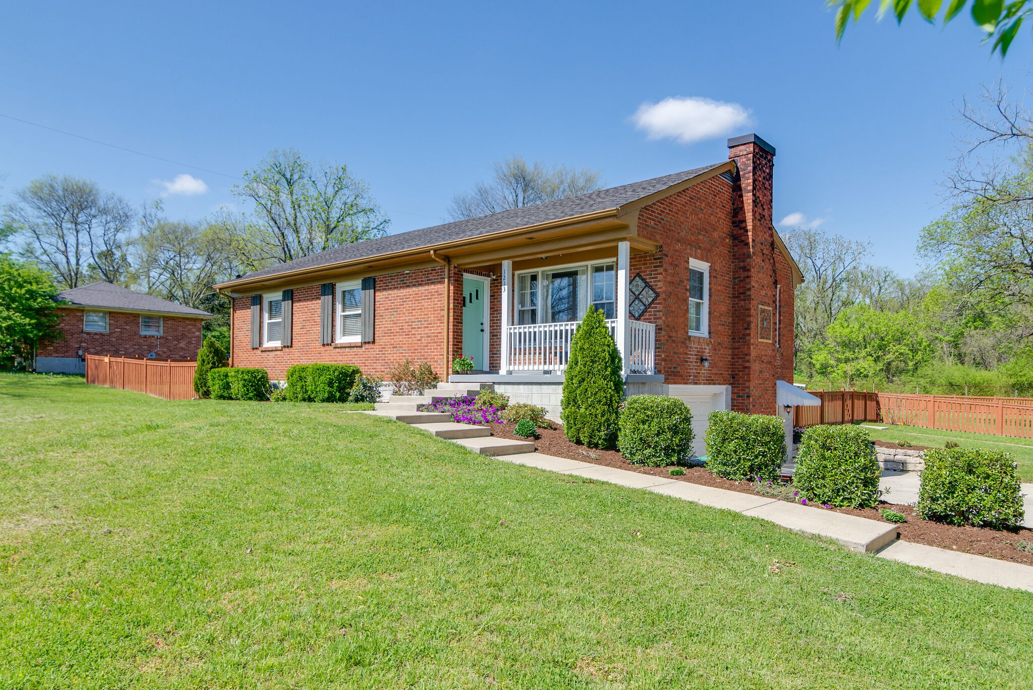 1213 Neelys Bend Road Madison, TN 37115 - Photo 1 of 36 a front view of house with yard and green space