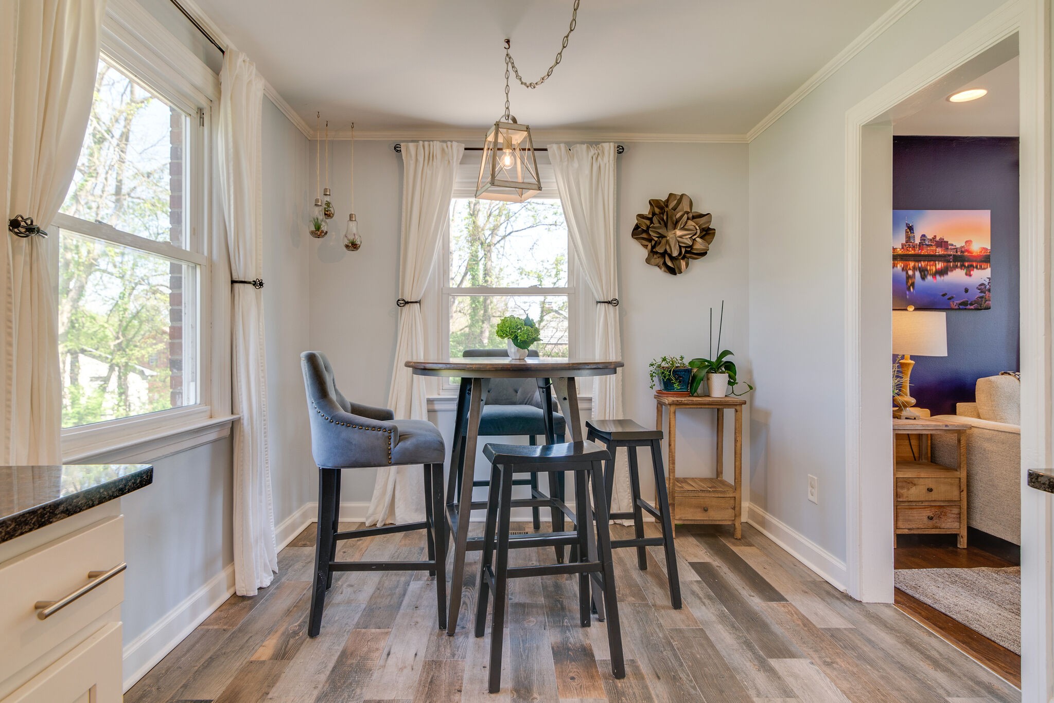 1213 Neelys Bend Road Madison, TN 37115 - Photo 11 of 36 a dining room with furniture window wooden floor