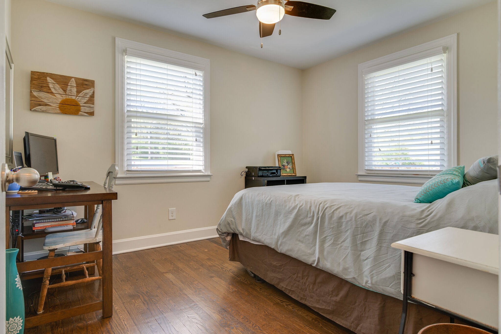 1213 Neelys Bend Road Madison, TN 37115 - Photo 19 of 36 a bedroom with a bed and a window