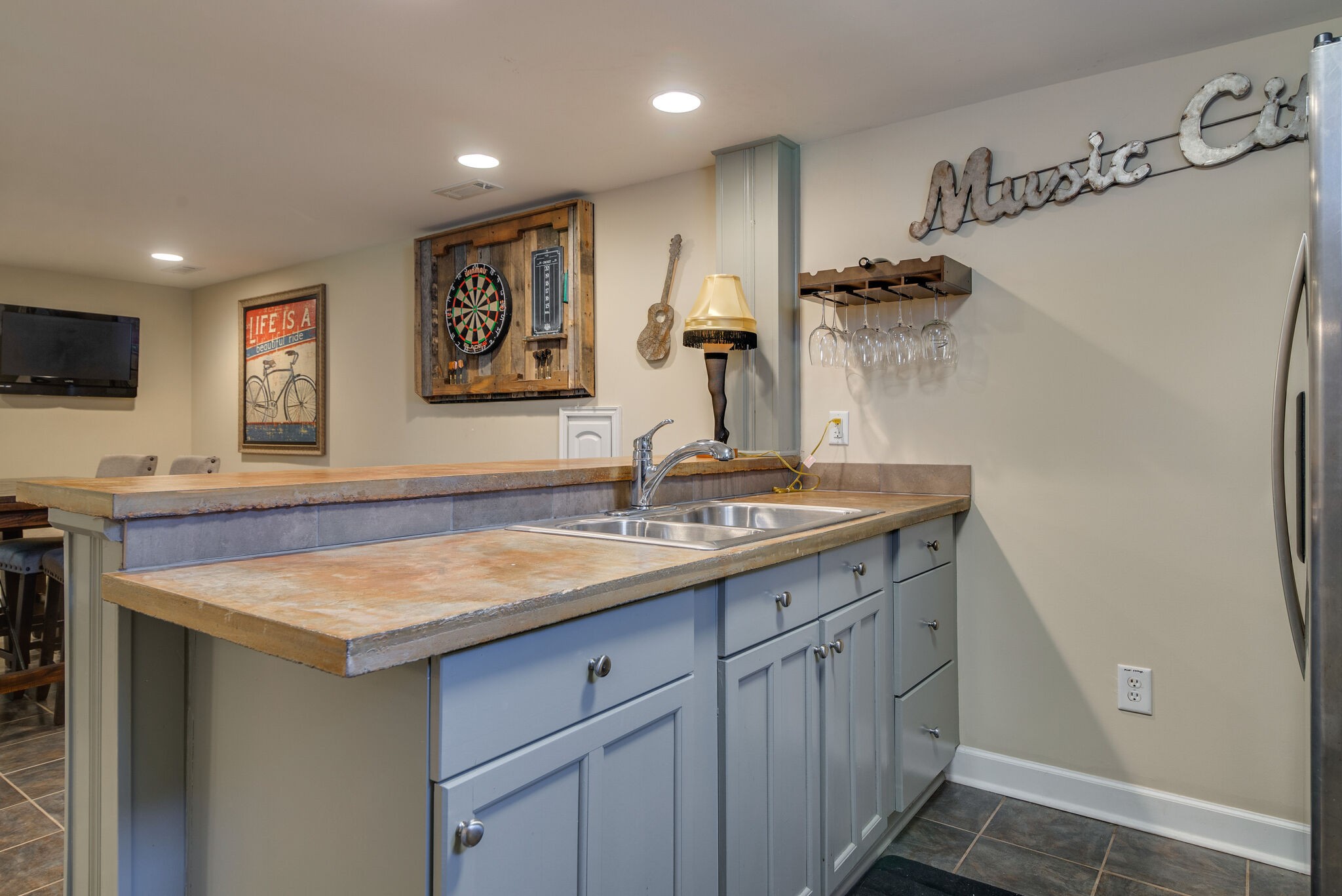 1213 Neelys Bend Road Madison, TN 37115 - Photo 26 of 36 a view of a kitchen with a sink and refrigerator