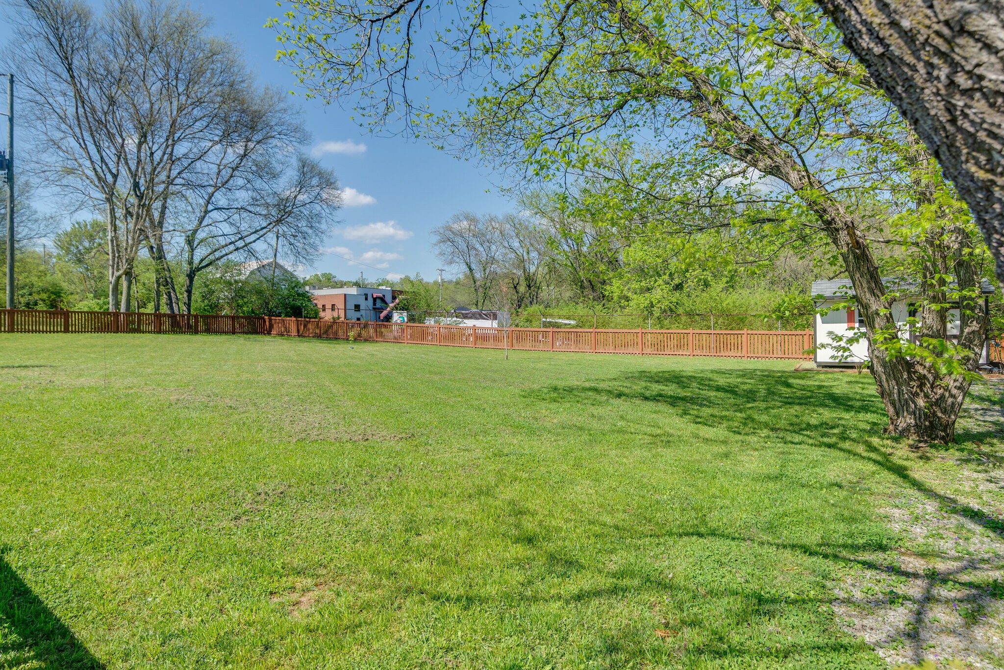 1213 Neelys Bend Road Madison, TN 37115 - Photo 33 of 36 a view of a field with trees in the background