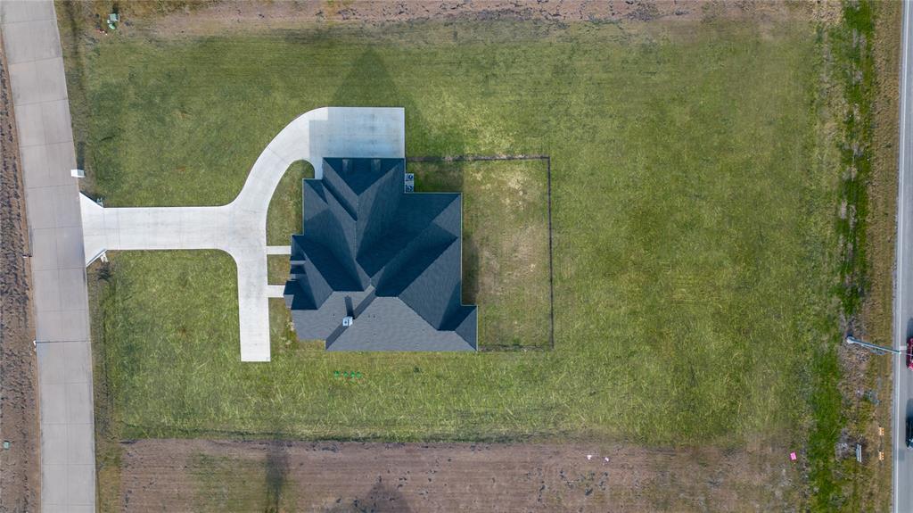 165 Ranch House Road Rockwall, TX 75032 - Photo 7 of 40 an aerial view of a house with a yard