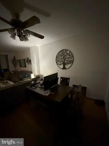 a kitchen with a sink appliances and cabinets