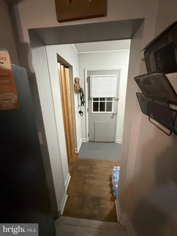 a room with furniture and gym equipment