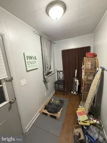 a bathroom with a sink toilet and mirror