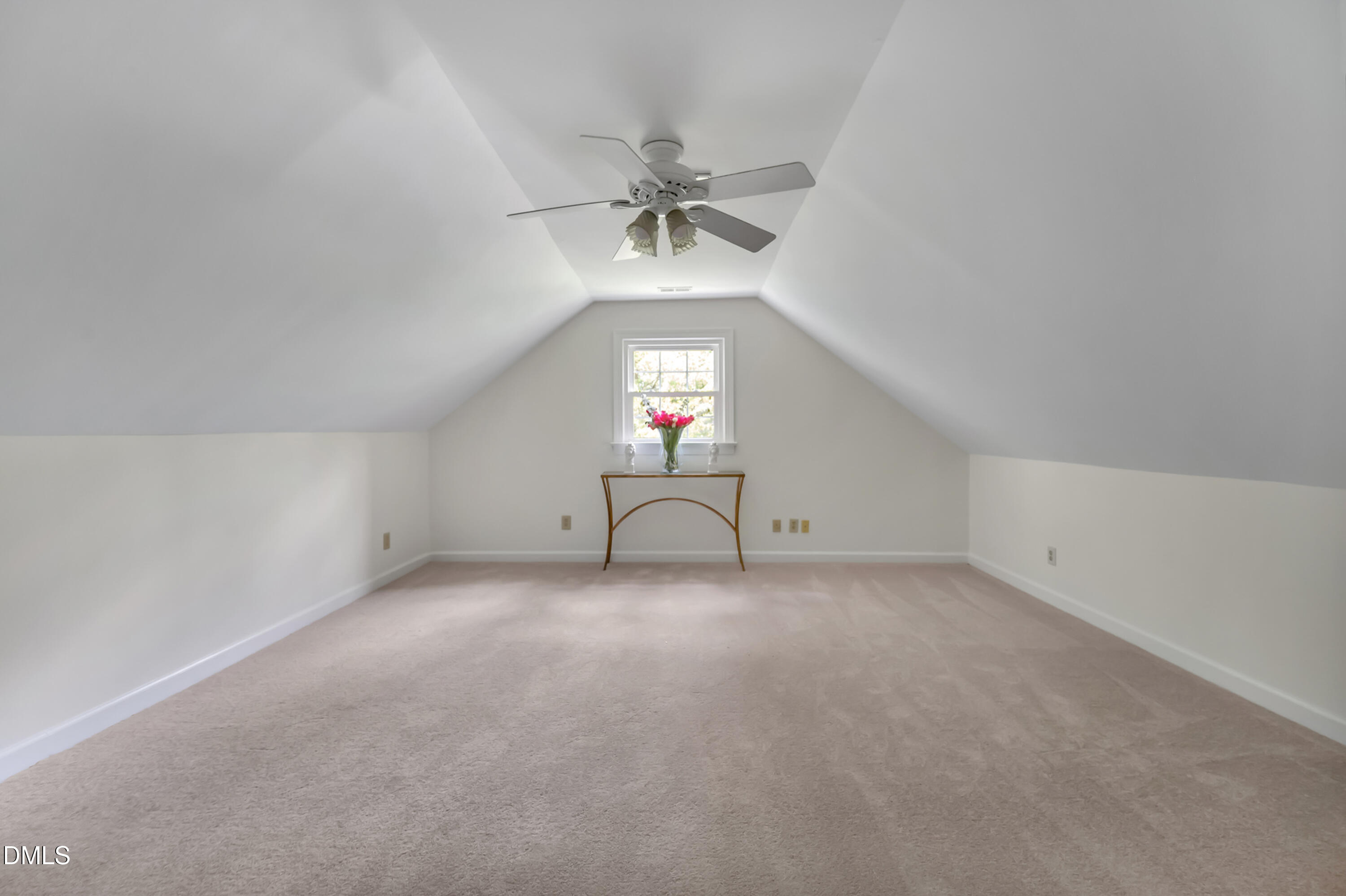 7500 Drayton Court Raleigh, NC 27615 - Photo 19 of 27 a view of a room with a ceiling fan and window