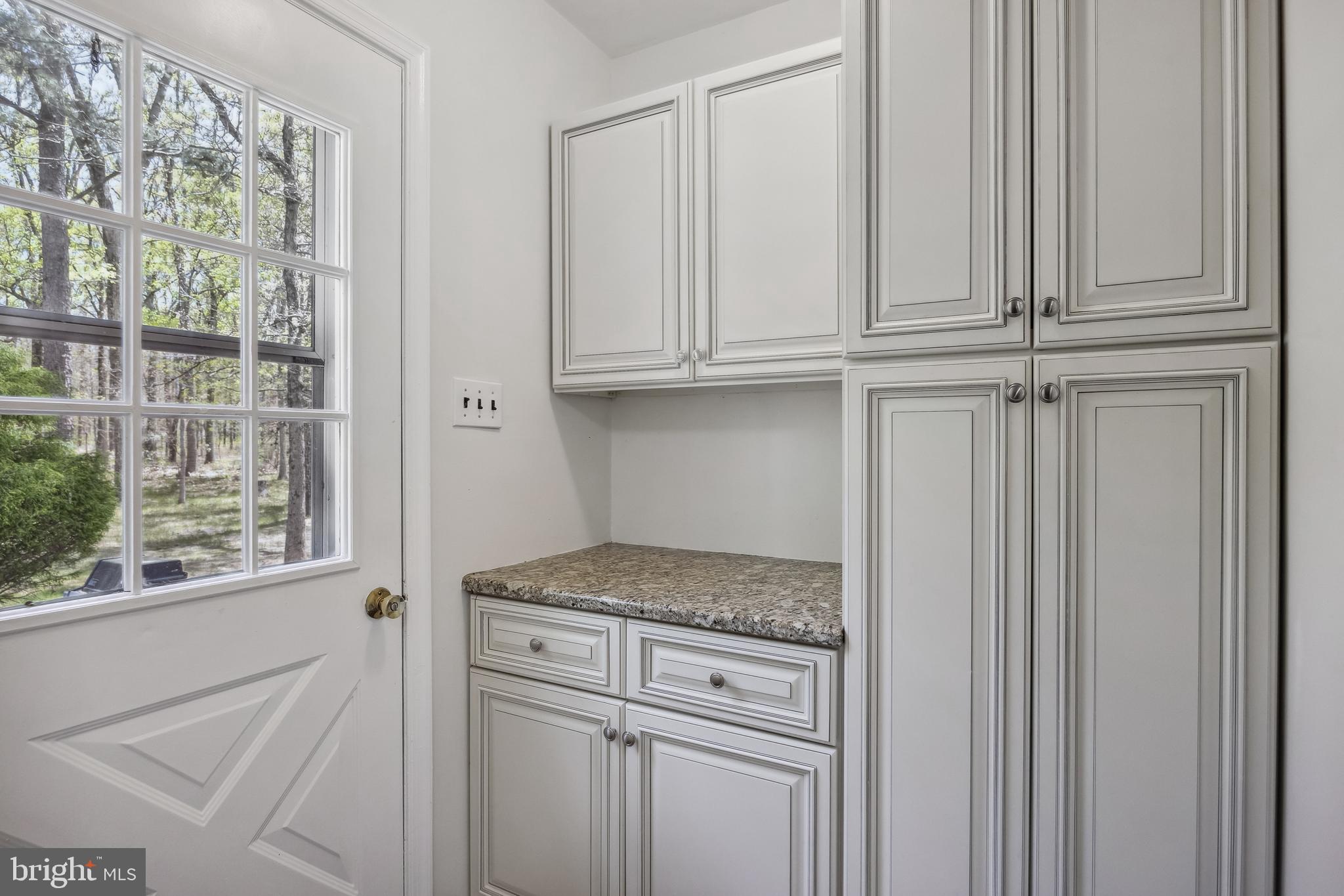 88 Oakshade Road Tabernacle, NJ 08088 - Photo 14 of 34 a kitchen with granite countertop white cabinets and a window