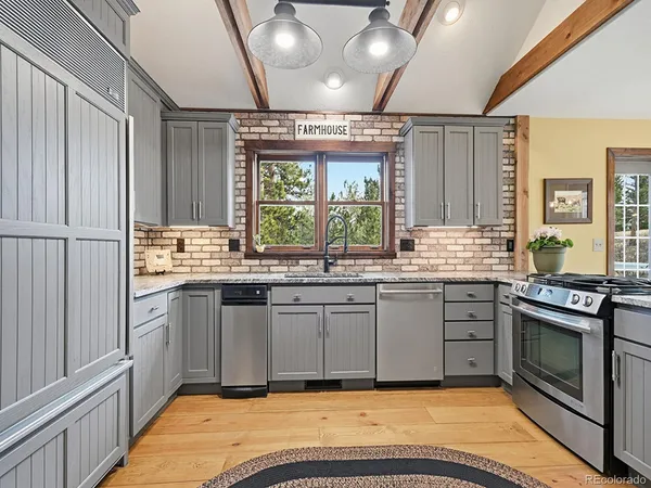 a view of a balcony with mountain view and wooden floor