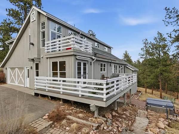 a view of a tree with plants