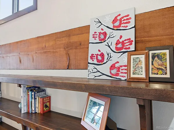 a spacious bedroom with a bed and a cabinets