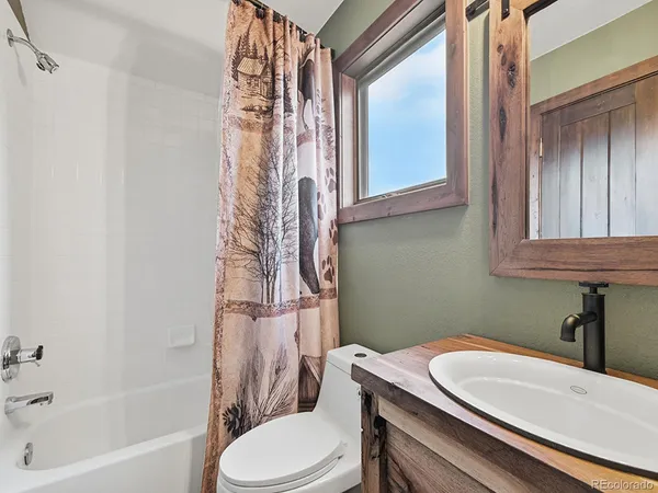 a view of a tree with a yard