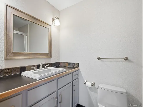 a view of a yard in the front of the house