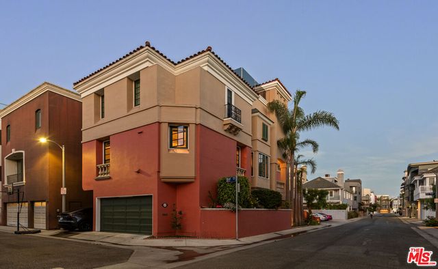 a view of a lake with a table and chairs