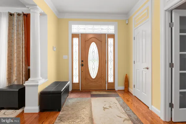 a view of a balcony with wooden floor