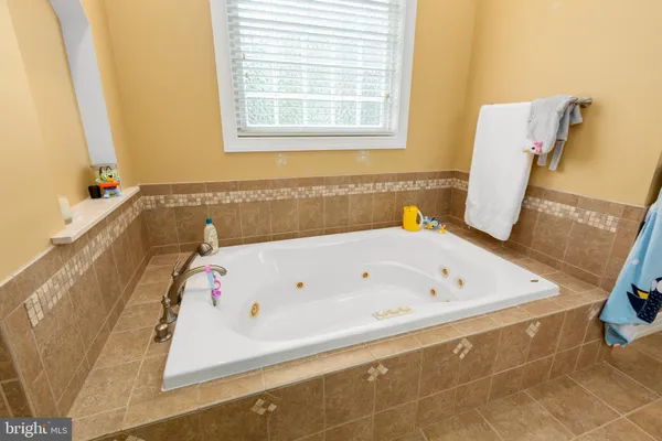 a room with toys and a flat screen tv