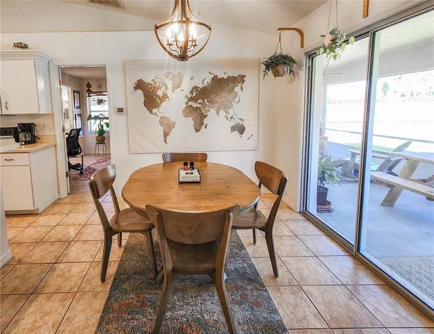 a bedroom with a bed and a desk