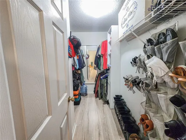 a kitchen with a stove and cabinets