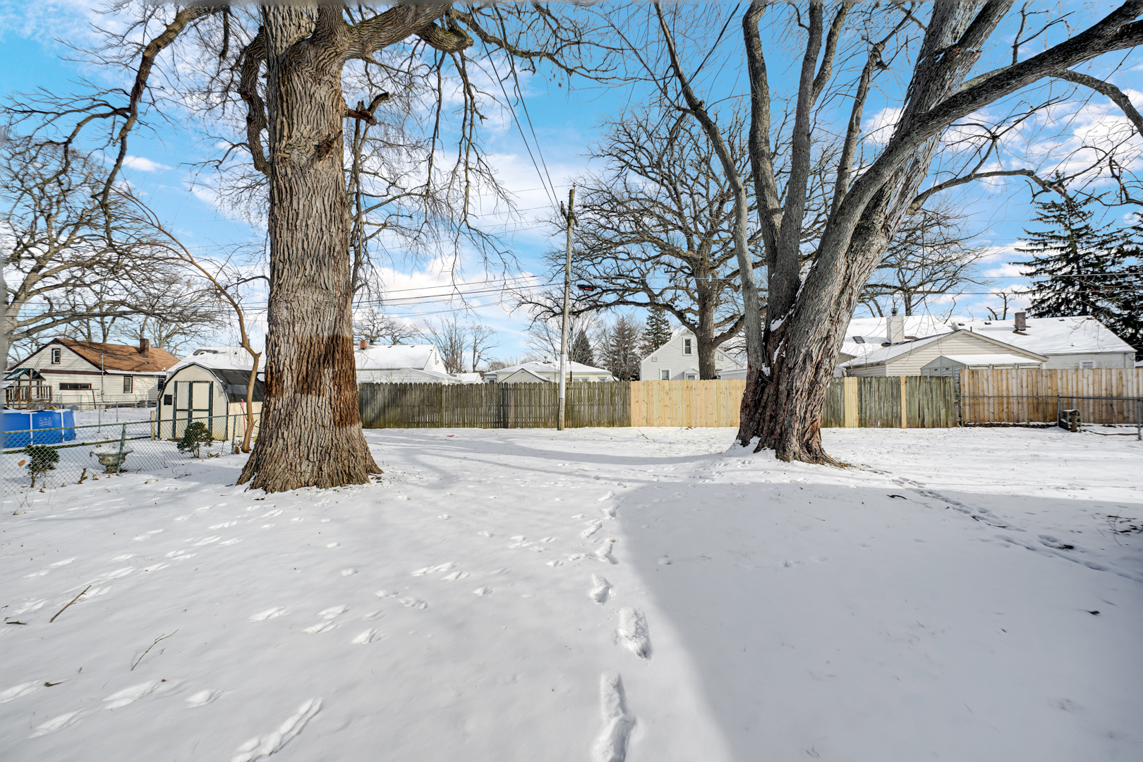 1376 Lennington Circle Northwest Kankakee, IL 60901 - Photo 16 of 16 a street view with large trees