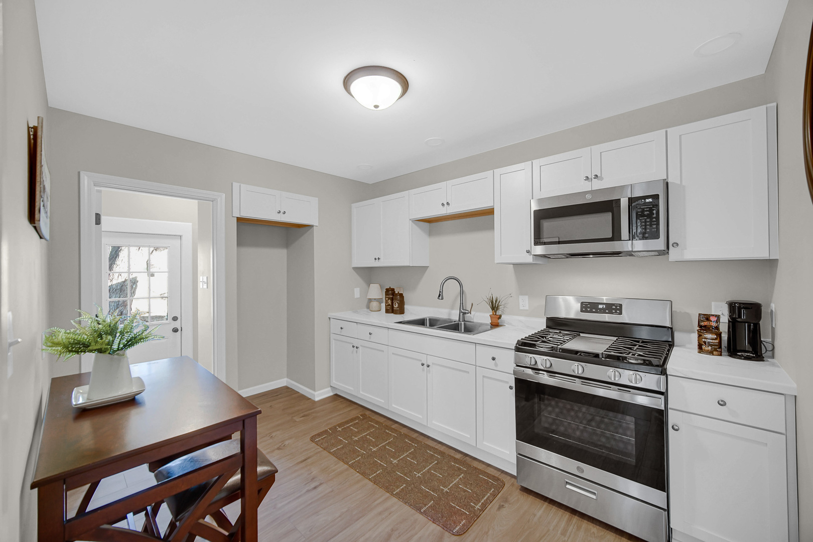 1376 Lennington Circle Northwest Kankakee, IL 60901 - Photo 5 of 16 a kitchen with cabinets stainless steel appliances and a counter space