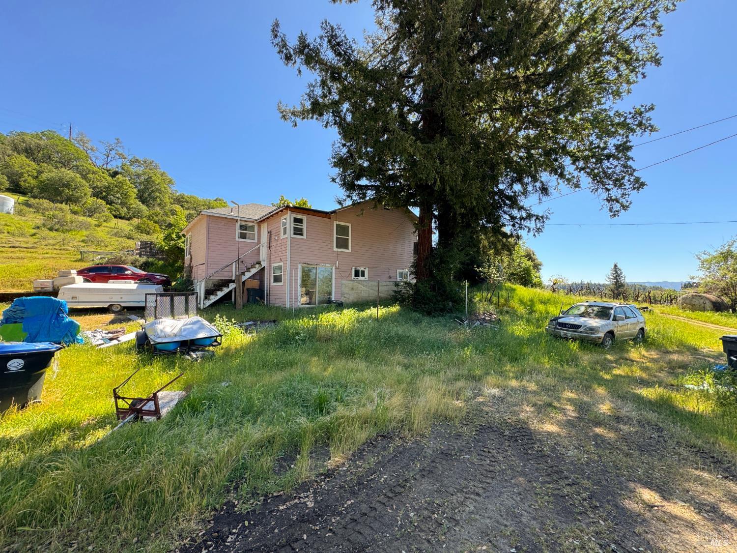 3981 Eastside Calpella Road Ukiah, CA 95482 - Photo 13 of 78 a view of a house with swimming pool yard and sitting area
