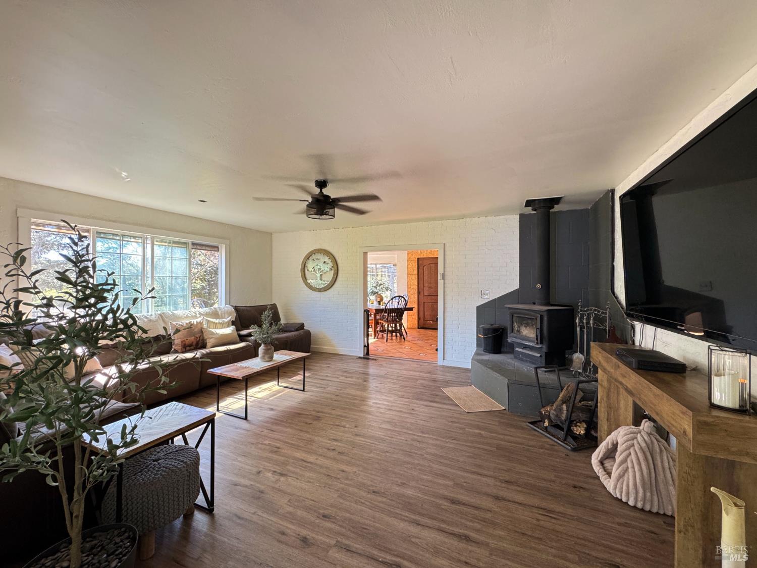 3981 Eastside Calpella Road Ukiah, CA 95482 - Photo 22 of 78 a living room with furniture and a flat screen tv