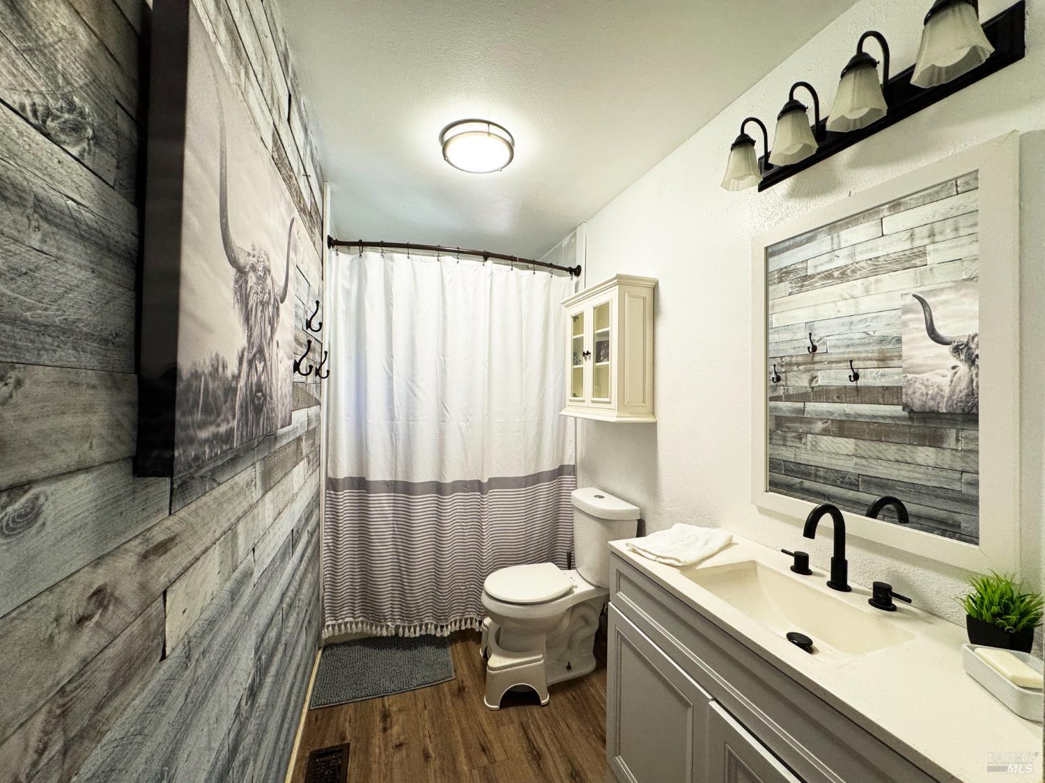 3981 Eastside Calpella Road Ukiah, CA 95482 - Photo 27 of 78 a bathroom with a sink a toilet and shower