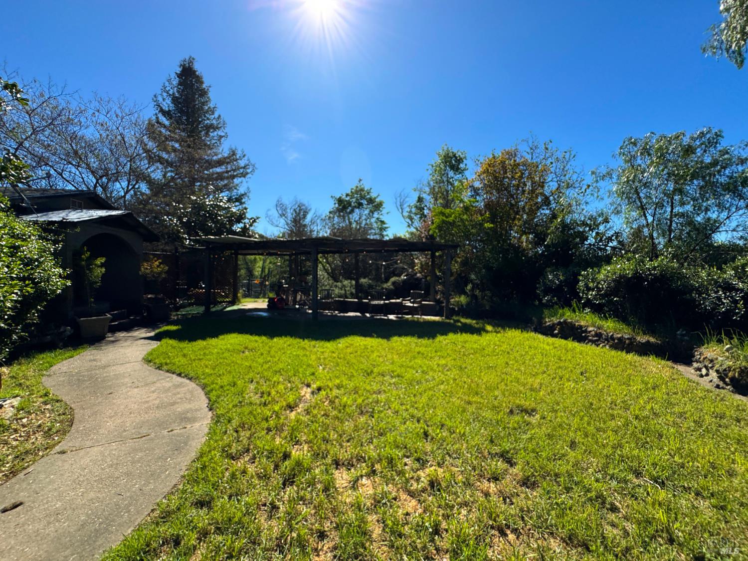 3981 Eastside Calpella Road Ukiah, CA 95482 - Photo 36 of 78 a view of a backyard with a garden
