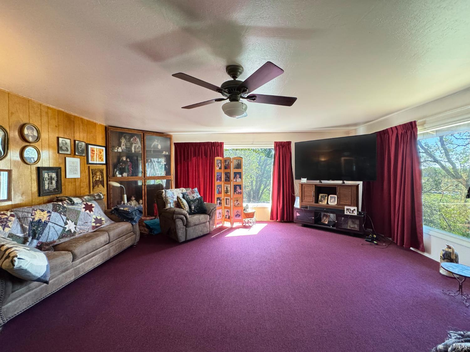 3981 Eastside Calpella Road Ukiah, CA 95482 - Photo 59 of 78 a living room with furniture and a flat screen tv