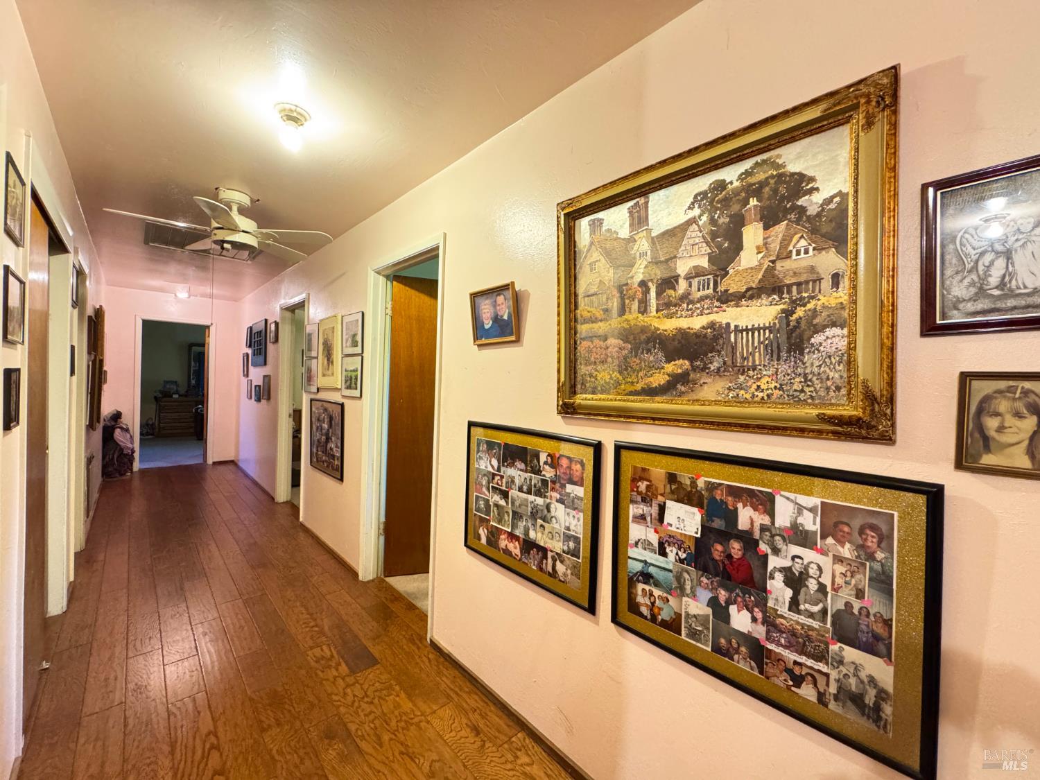 3981 Eastside Calpella Road Ukiah, CA 95482 - Photo 63 of 78 a view of a hallway with wooden floor and furniture