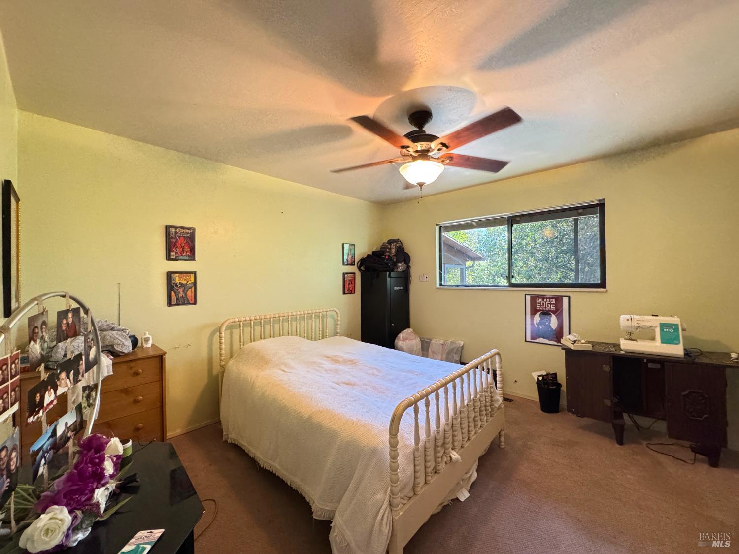 3981 Eastside Calpella Road Ukiah, CA 95482 - Photo 67 of 78 a bedroom with a bed a desk and chair