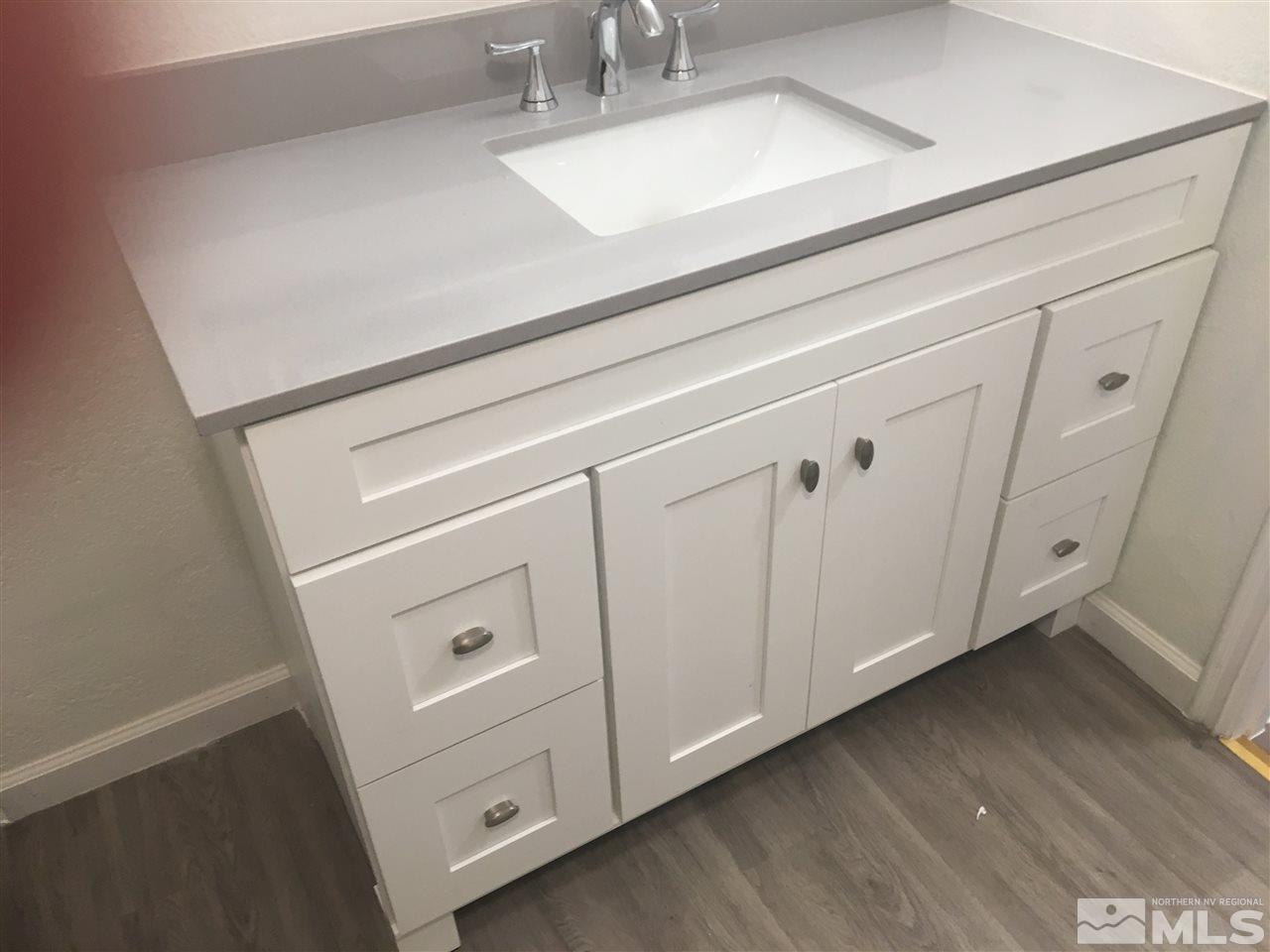 3951 West 7th Street Reno, NV 89503 - Photo 9 of 17 a view of cabinets with wooden floor