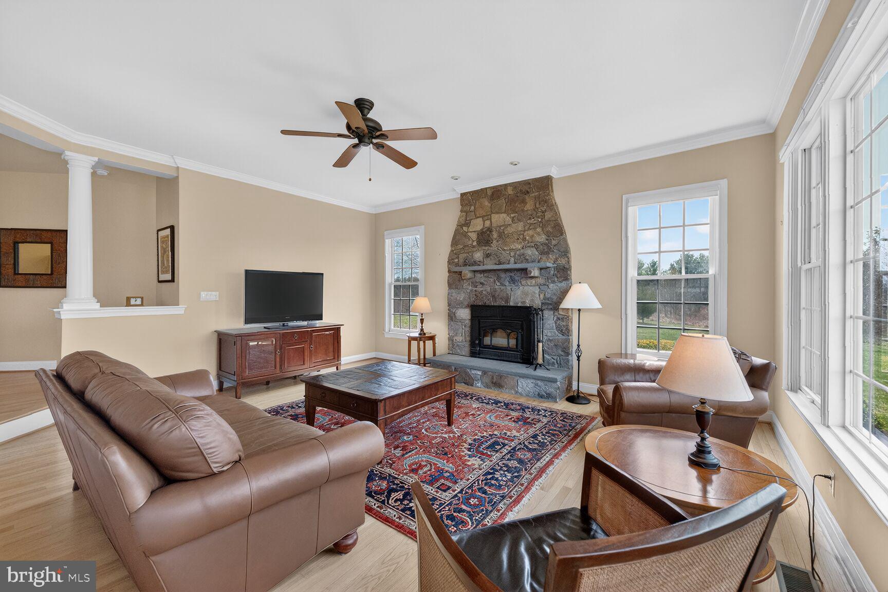 15371 Limestone School Road Leesburg, VA 20176 - Photo 23 of 54 Cozy living space with stone fireplace.