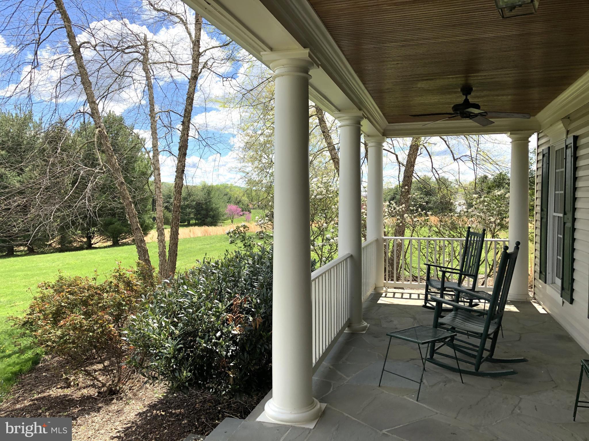 15371 Limestone School Road Leesburg, VA 20176 - Photo 3 of 71 Beautiful front porch with open countryside views.