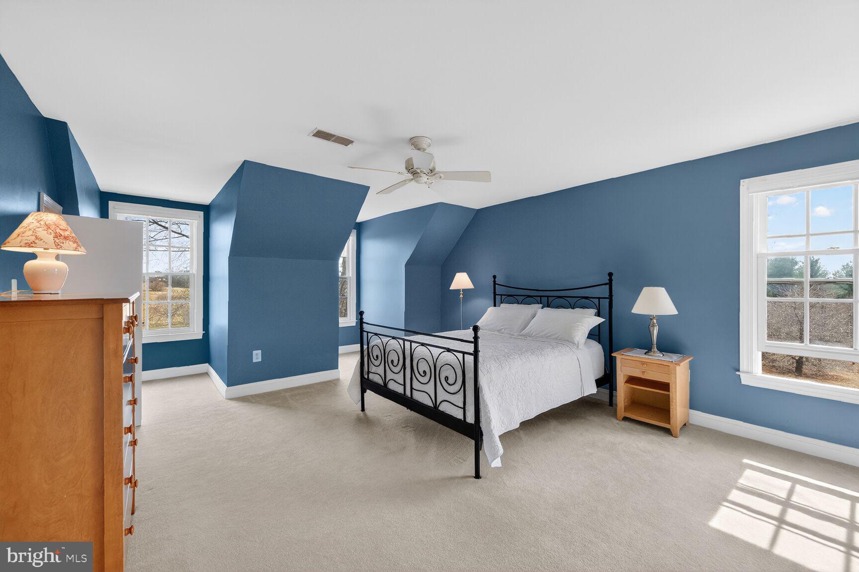 15371 Limestone School Road Leesburg, VA 20176 - Photo 41 of 54 Serene blue-hued bedroom retreat.