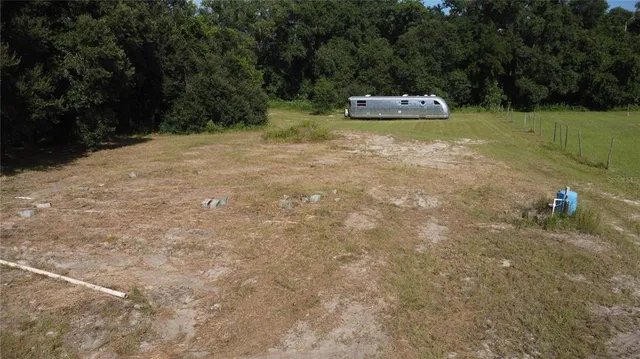 a small pool with a yard