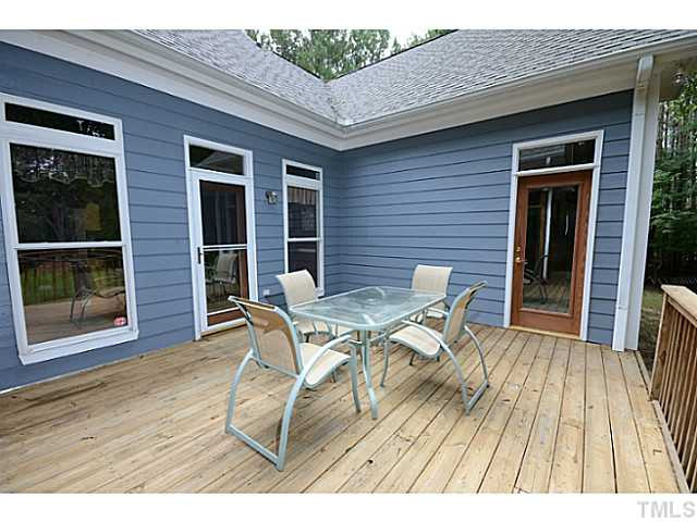 1815 Shaw Road Durham, NC 27704 - Photo 20 of 24 Enjoy entertaining on this great deck that overlooks the property and pond. Patio/Deck