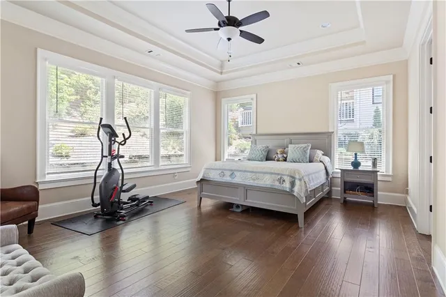 a bedroom with bed window and furniture