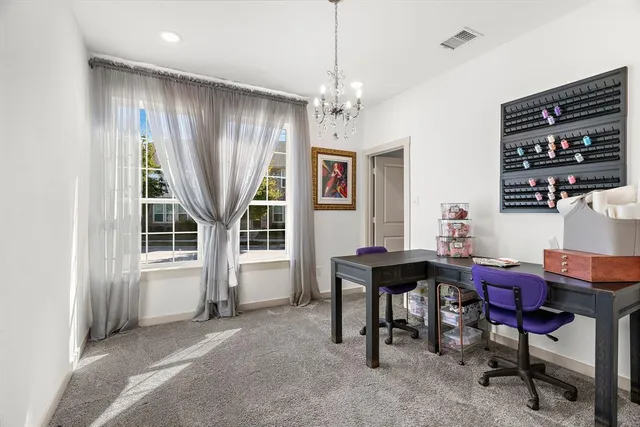 a view of a livingroom with furniture and window