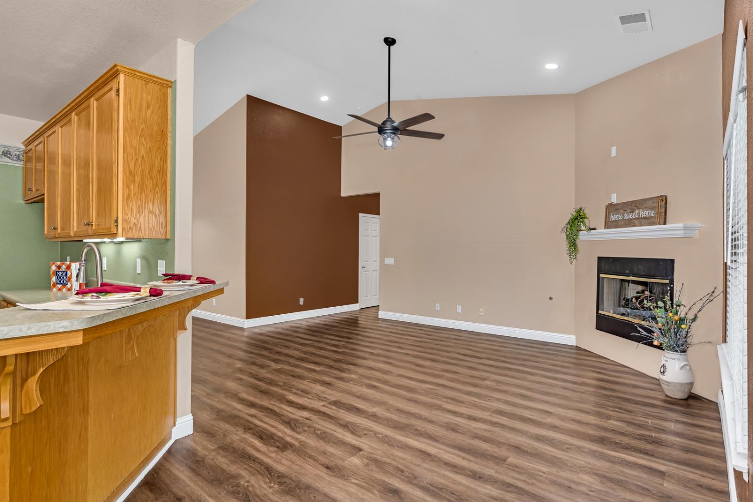 3877 Pintail Court Merced, CA 95340 - Photo 15 of 42 a view of a kitchen with a sink and a kitchen