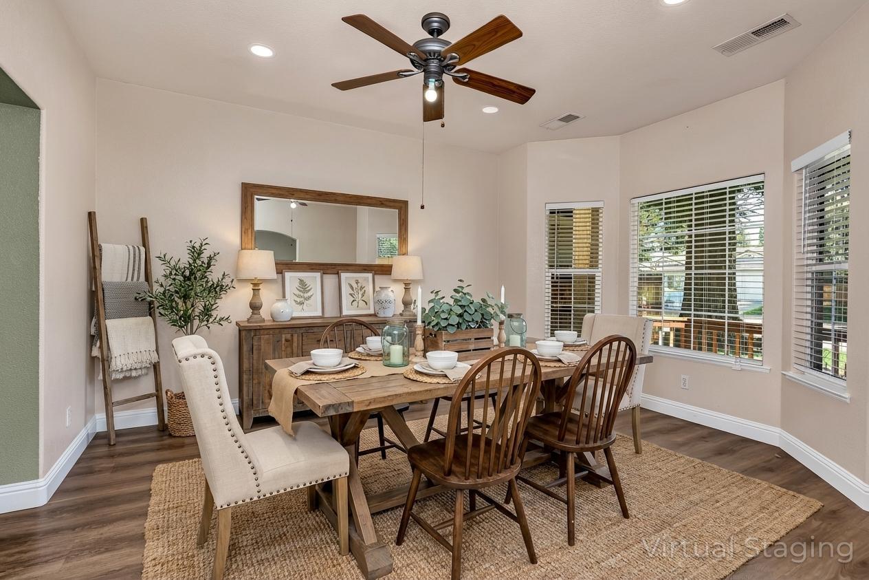 3877 Pintail Court Merced, CA 95340 - Photo 19 of 42 a view of a dining room with furniture and window