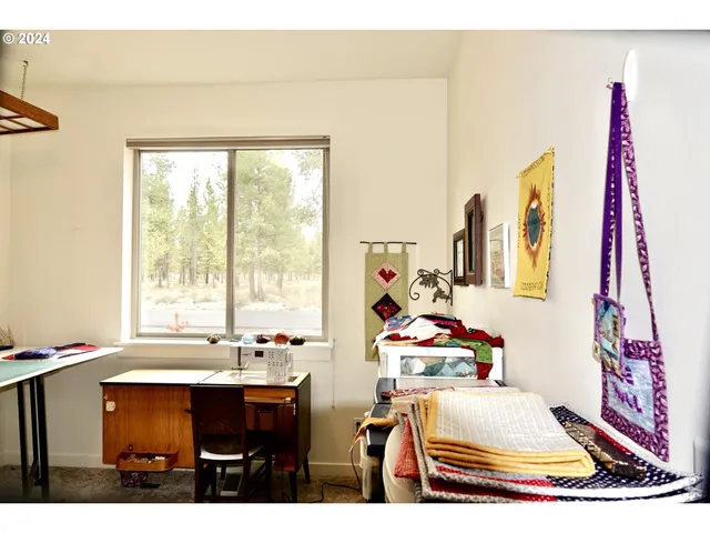 a view of porch with a bench