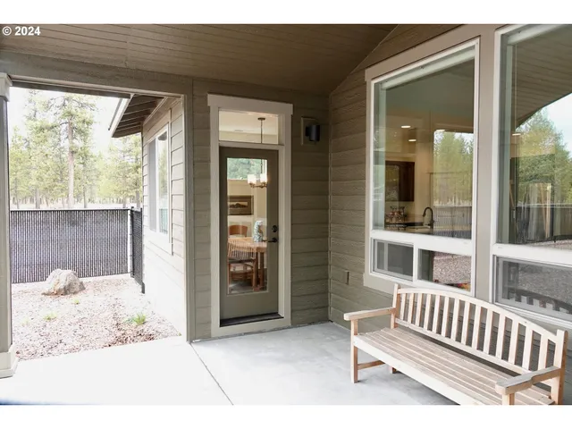a house view with a backyard space