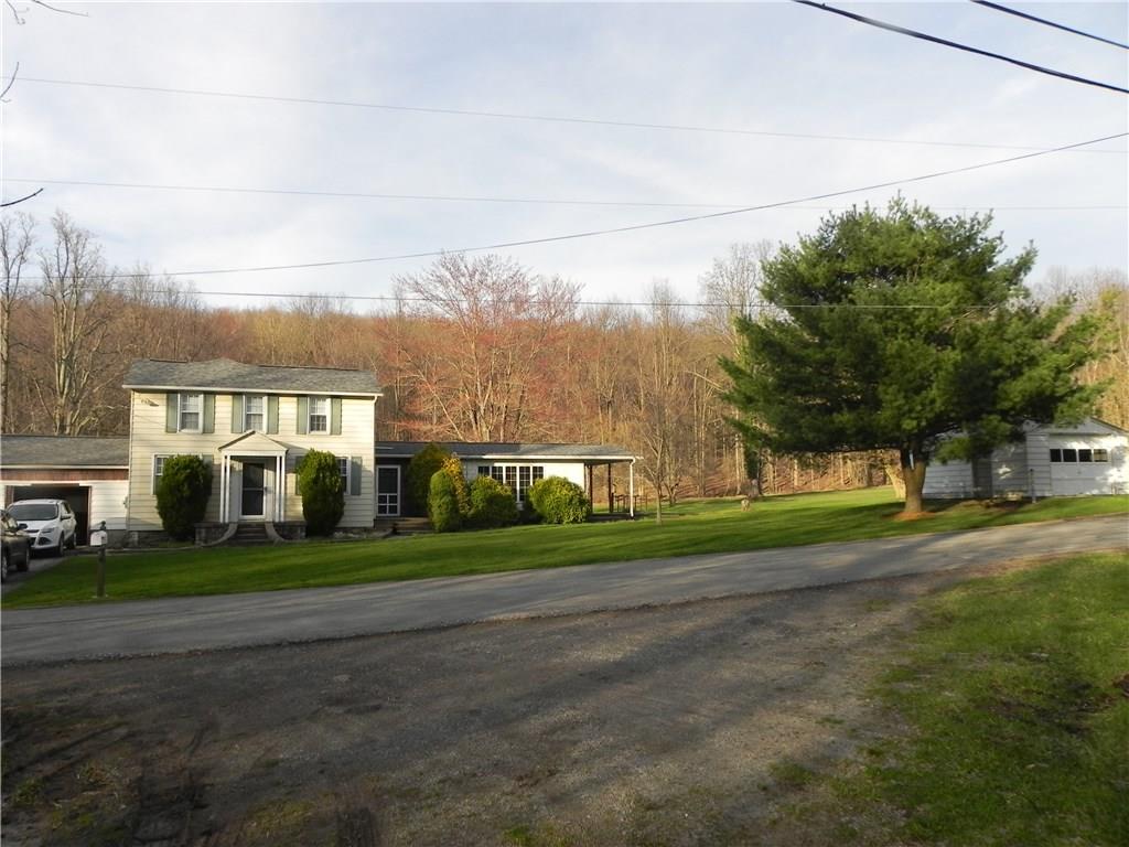 1267 Millwood Road Derry, PA 15627 - Photo 11 of 17 View from across the street. Note the super private back yard and detached garage!