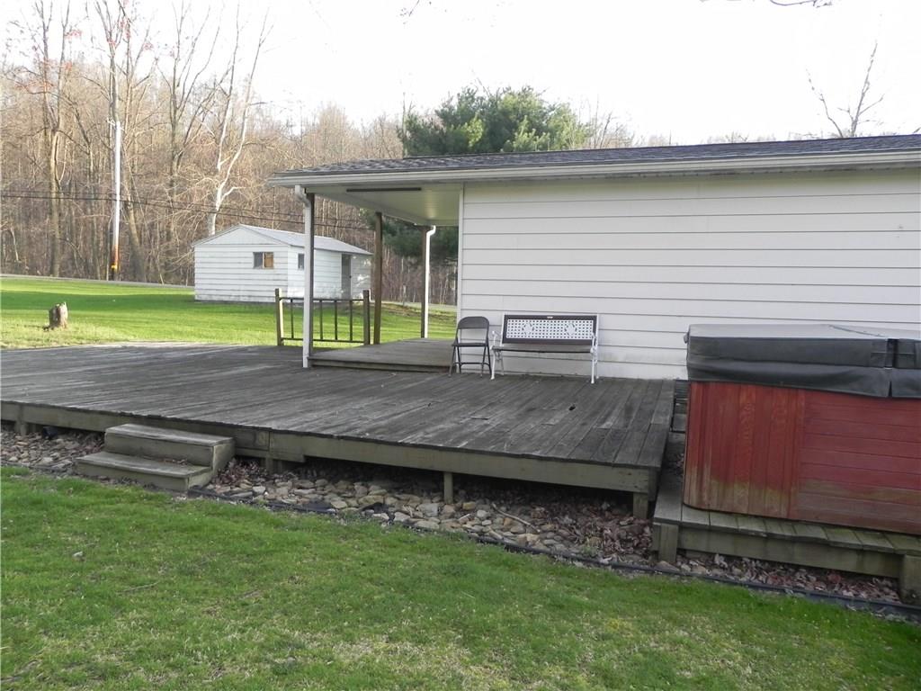 1267 Millwood Road Derry, PA 15627 - Photo 14 of 17 Hot tub will be begging for you to heat it up and slip in!
